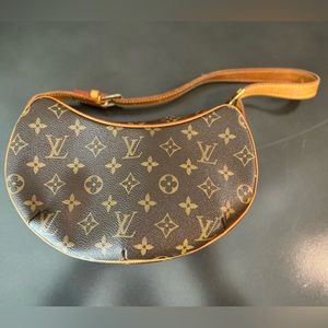 Louis Vuitton Croissant Pochette Monogram bag monogram canvas & natural leather